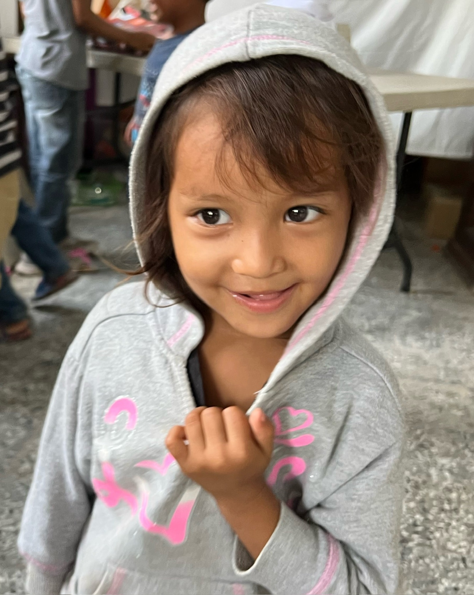 A young girl smiling in Honduras